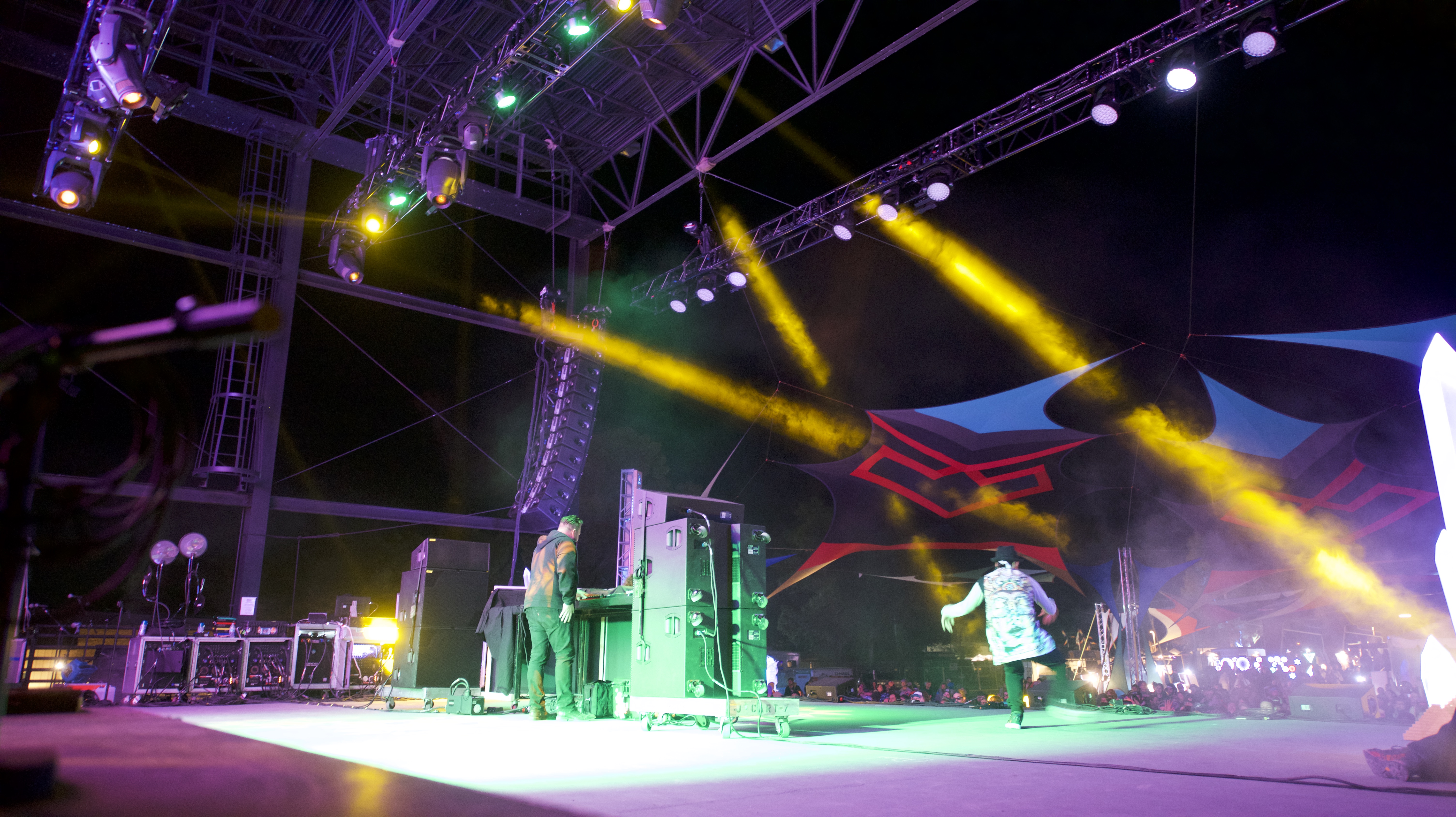 The Sacred G's dancing on stage.