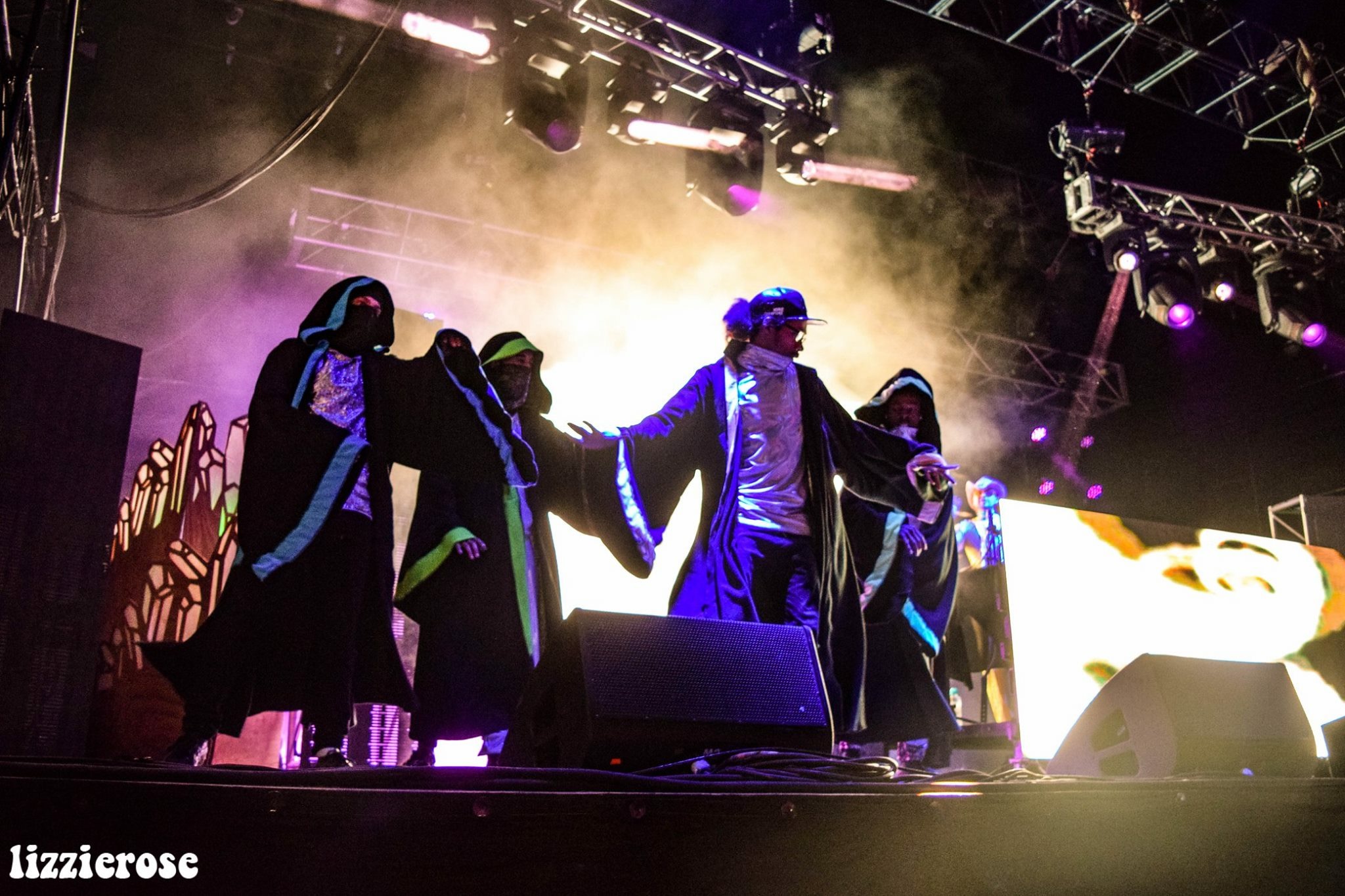 The Sacred G's dancing on stage.