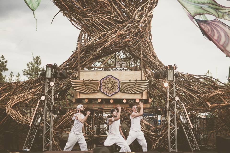 The Sacred G's dancing on stage.