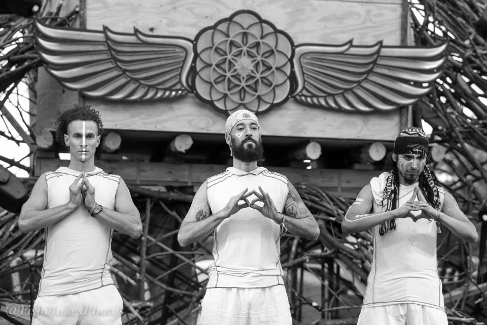 The Sacred G's dancing on stage.