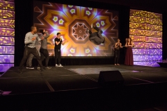 The Sacred G's dancing on stage.