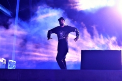 The Sacred G's dancing on stage.