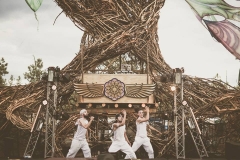 The Sacred G's dancing on stage.